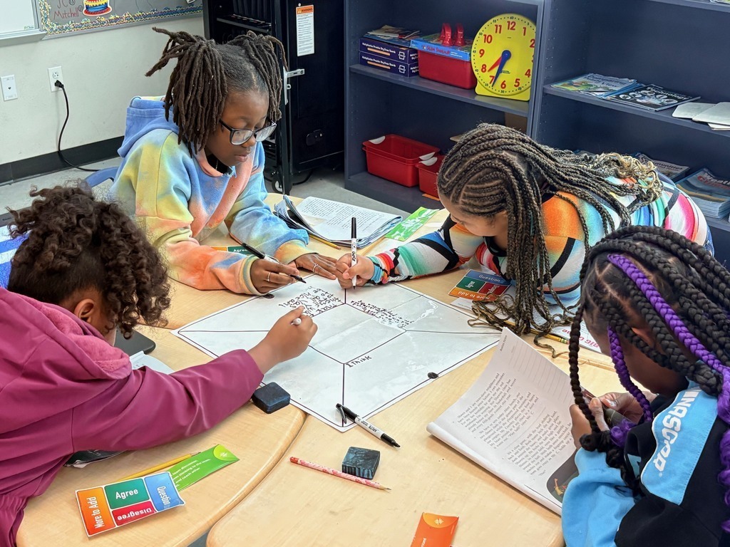 students working at a desk