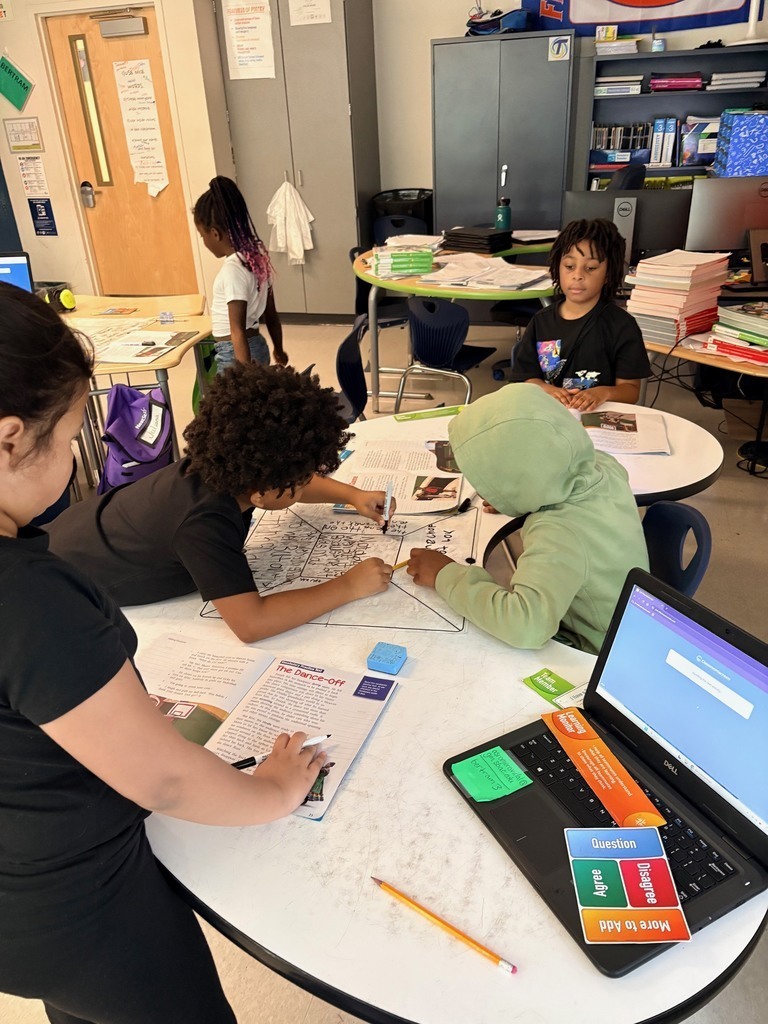 students working at a desk