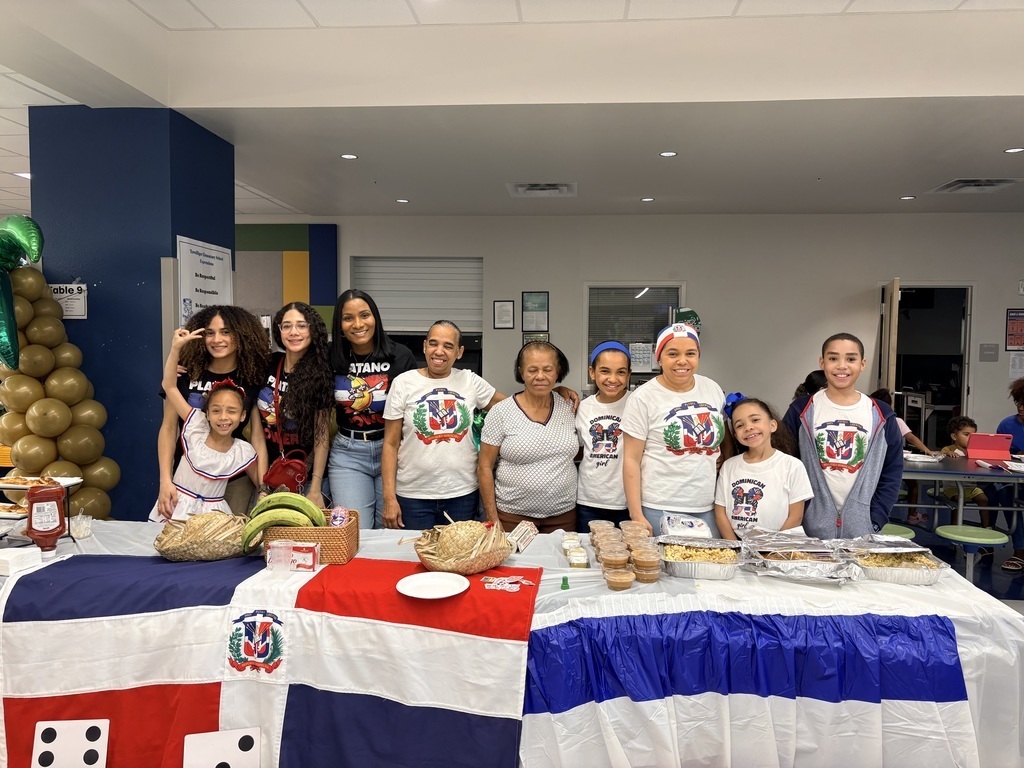 group of people at a food table
