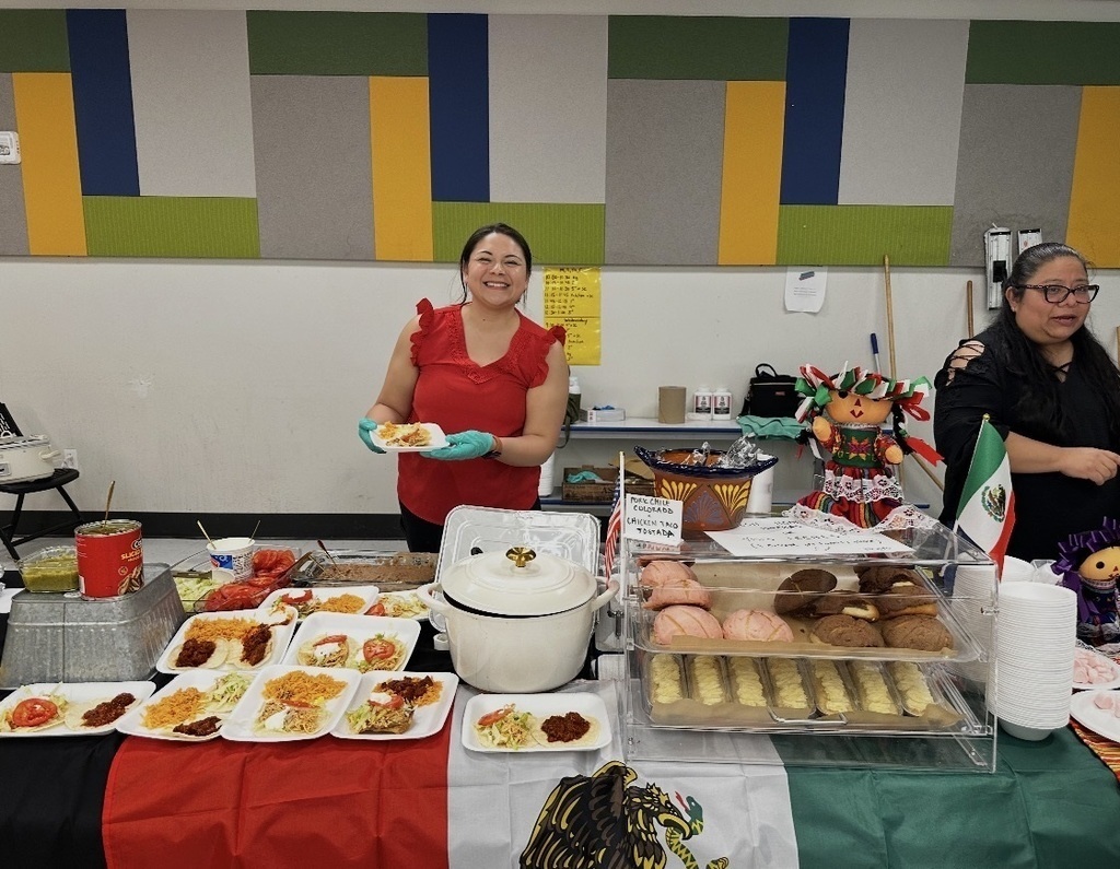 women at food table for Mexico