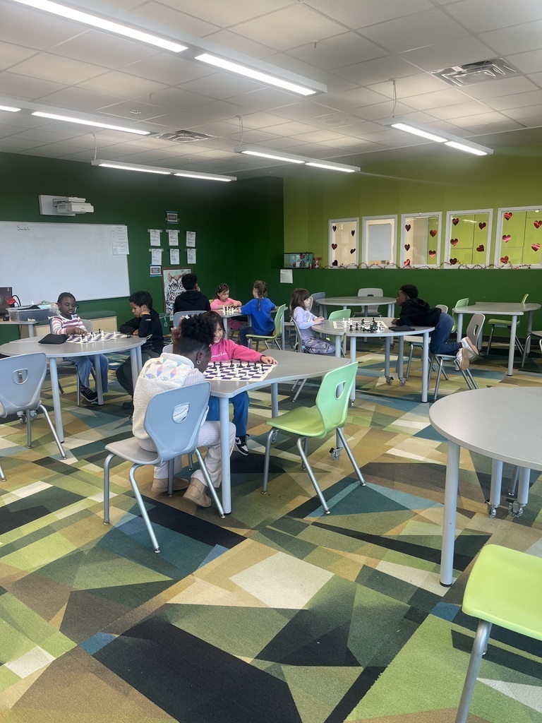students playing chess at tables