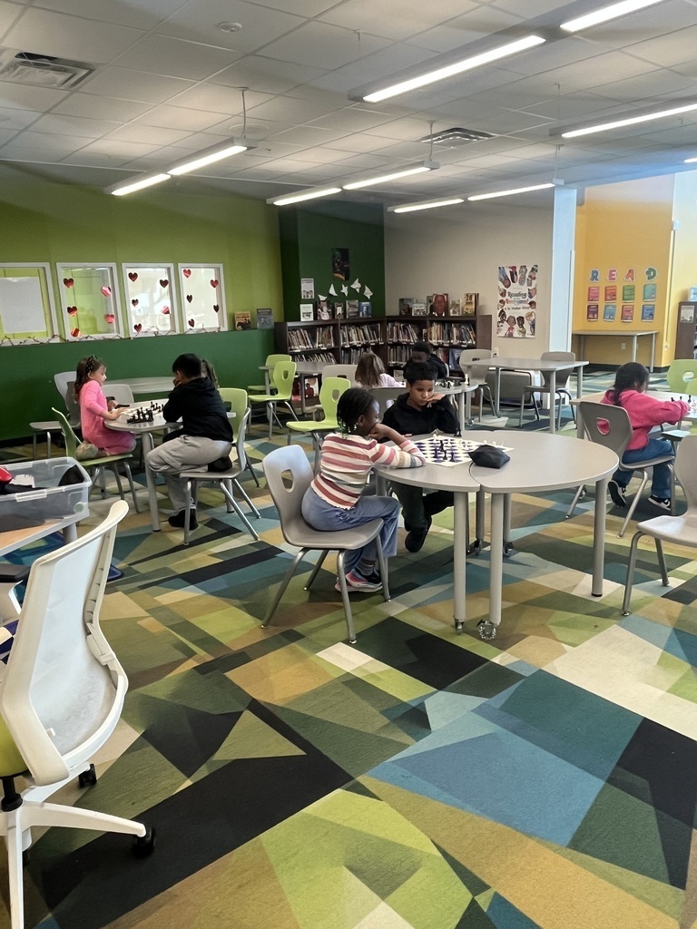 students playing chess at tables