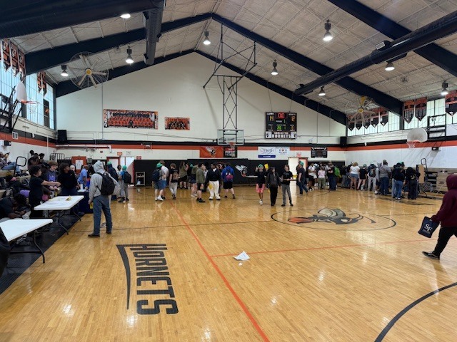 Students in gym participating in career fair