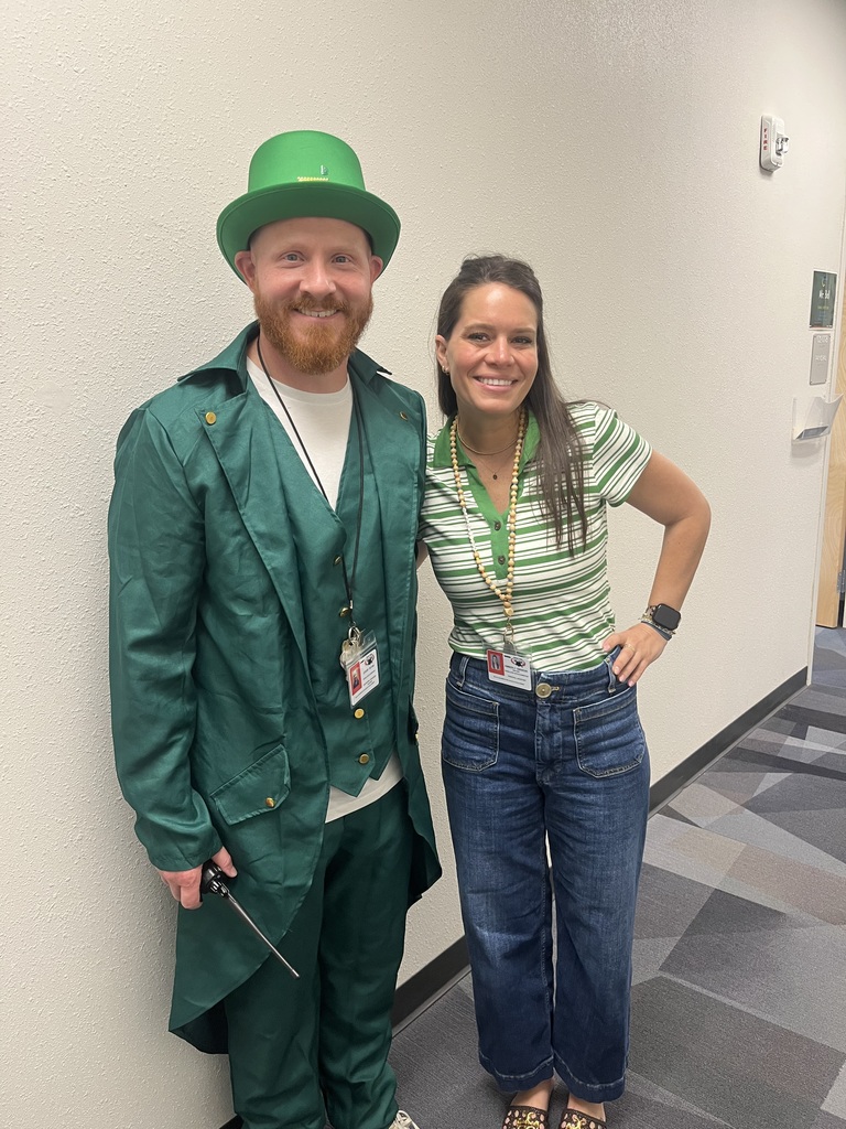 Mr. Rutan in a leprechaun costume with AP Obenour