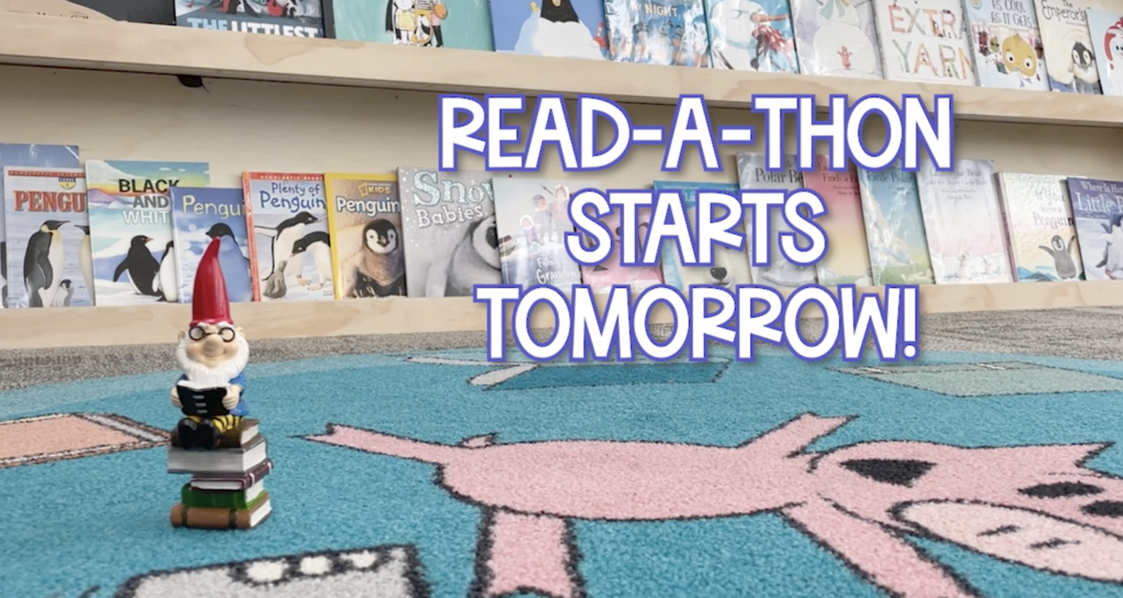 Dewey on the carpet with the words "Read-a-thon starts tomorrow!" 