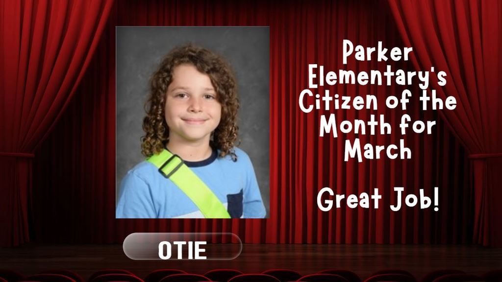Red curtain reveals  photo of student of the month for March