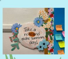 Kindness bulletin board with positive messages to share white flowers and flower border