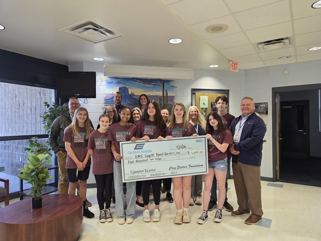 Kanapaha Band officers and Clay Electric with check donation