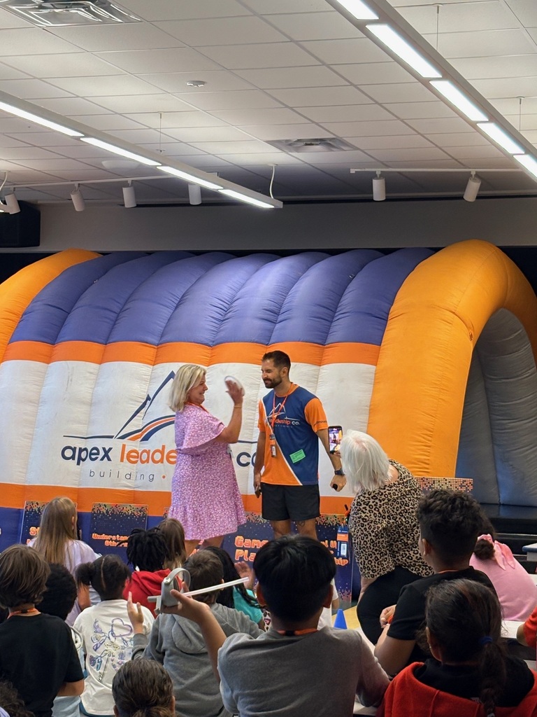 teacher pieing a man in the face
