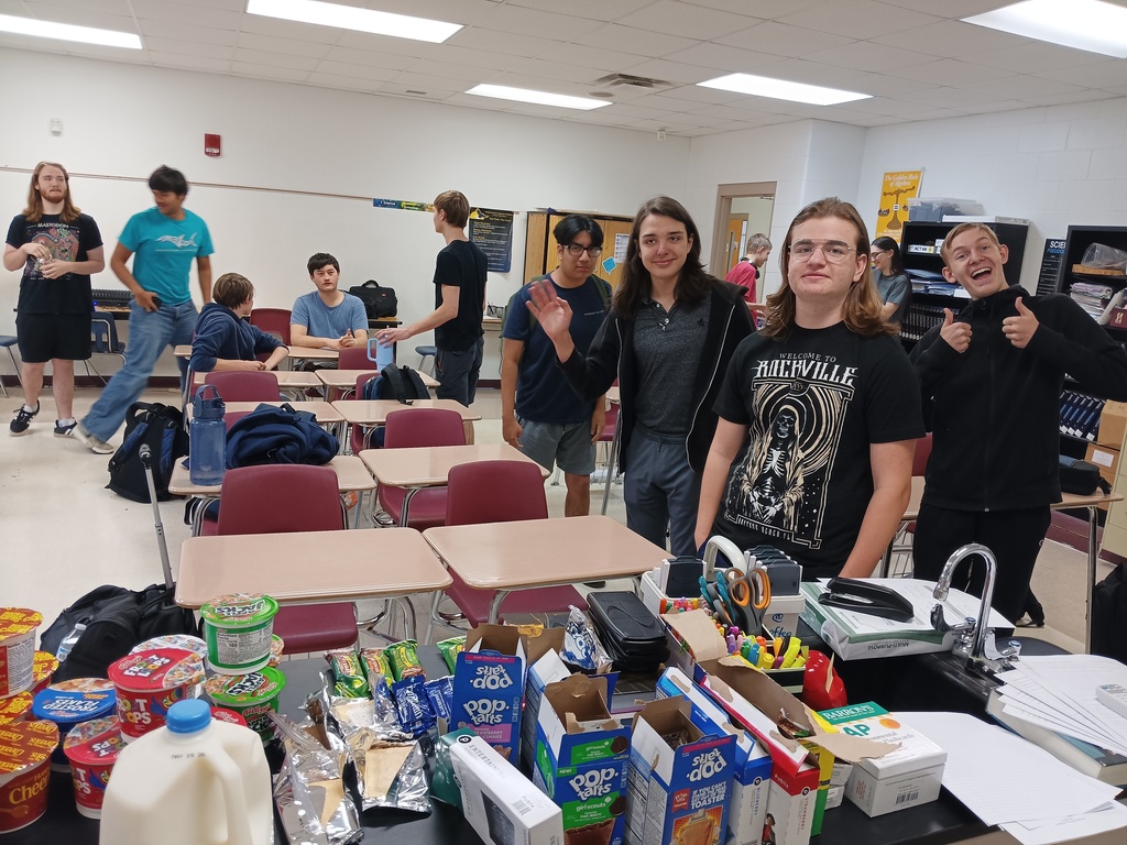 students stand line for breakfast