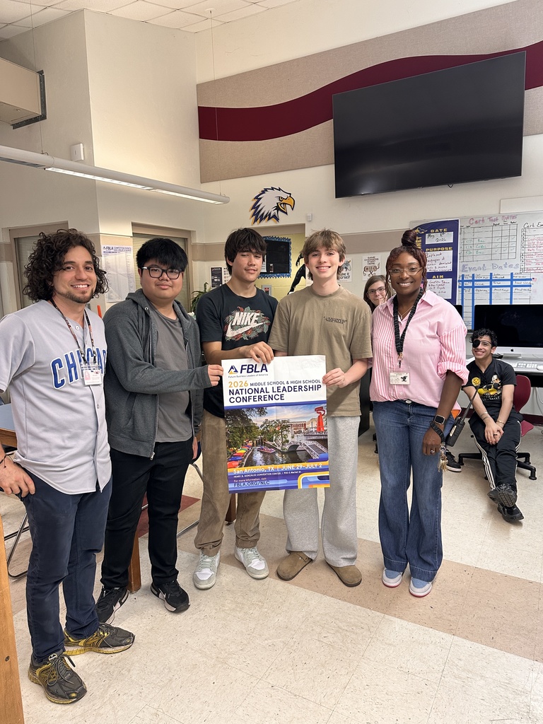a teacher and 3 students stand with the assistant principal
