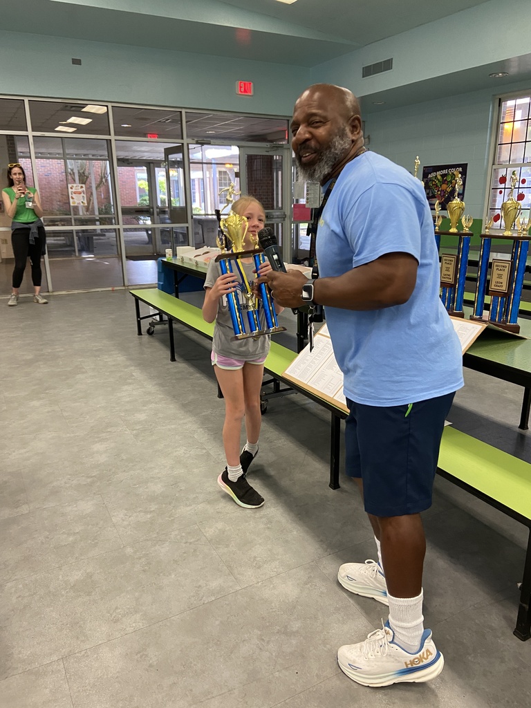 Flyer Fitness Celebration with trophies