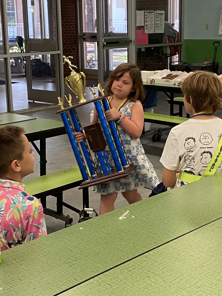 Flyer Fitness Celebration with trophies