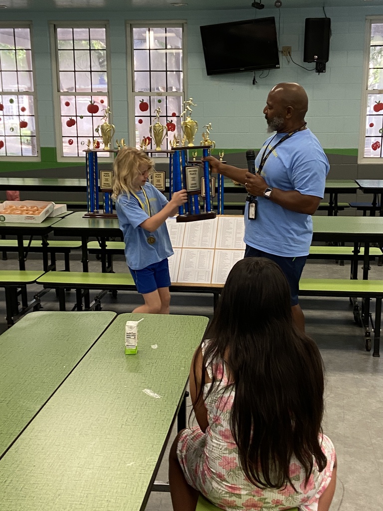 Flyer Fitness Celebration with trophies