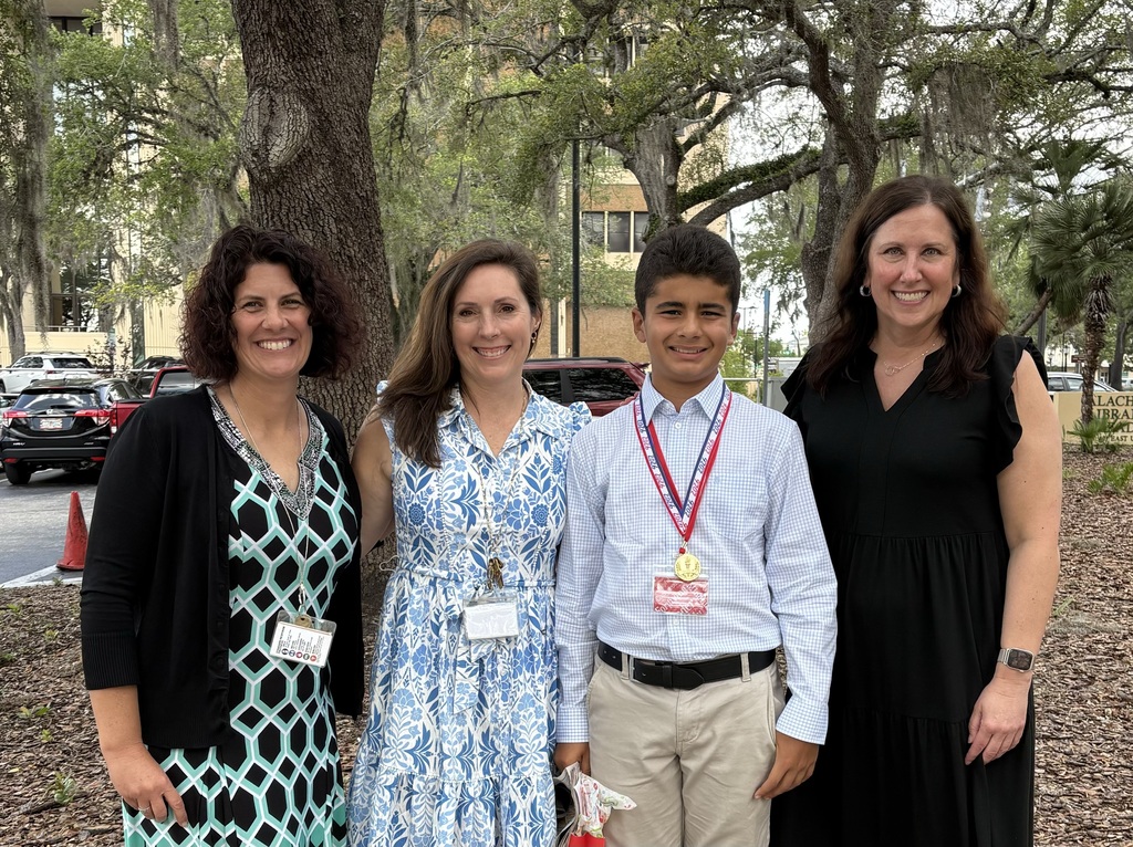 Citizen of the year photo with stars and text with family and principal