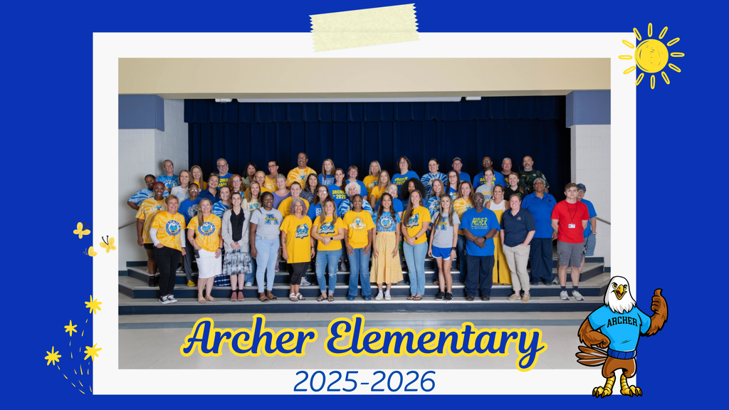 Group picture of Archer Elementary's faculty and staff on the steps of the stage