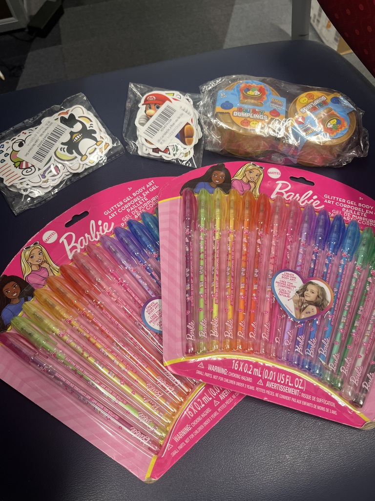 picture of pens, stickers, and fidgets