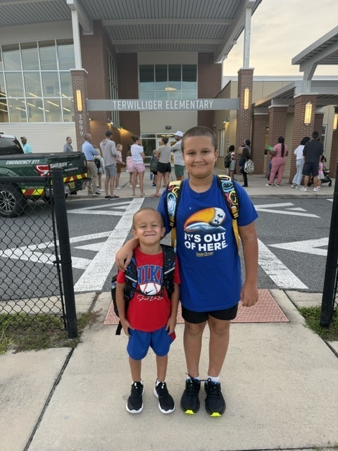 kids in front of a school