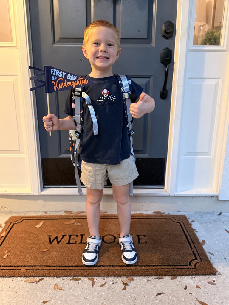 kid with a thumbs up