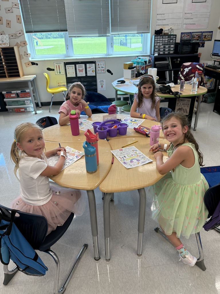 4 students at desks working