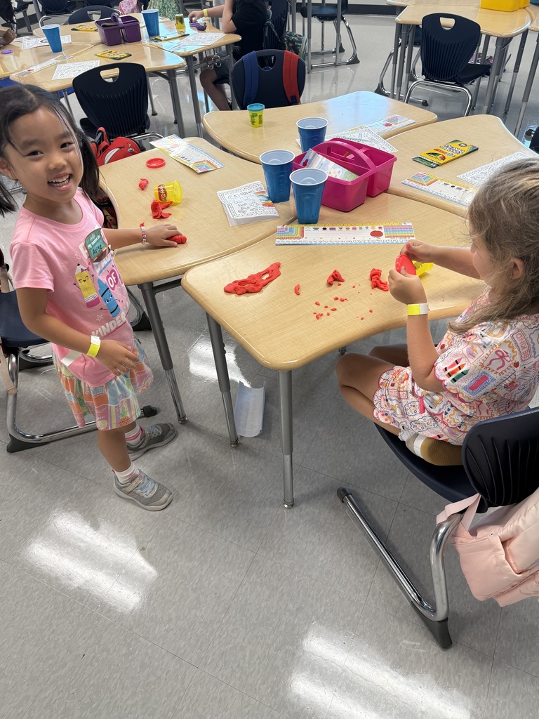 students using play Doh