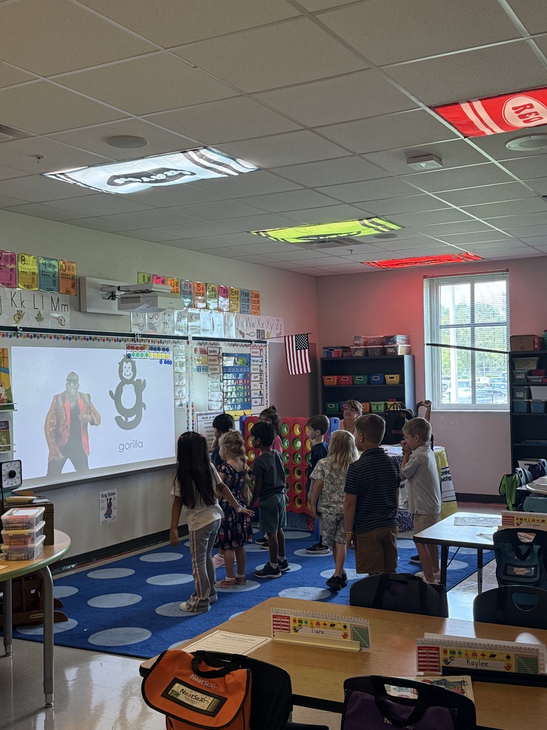 students dancing in a classroom