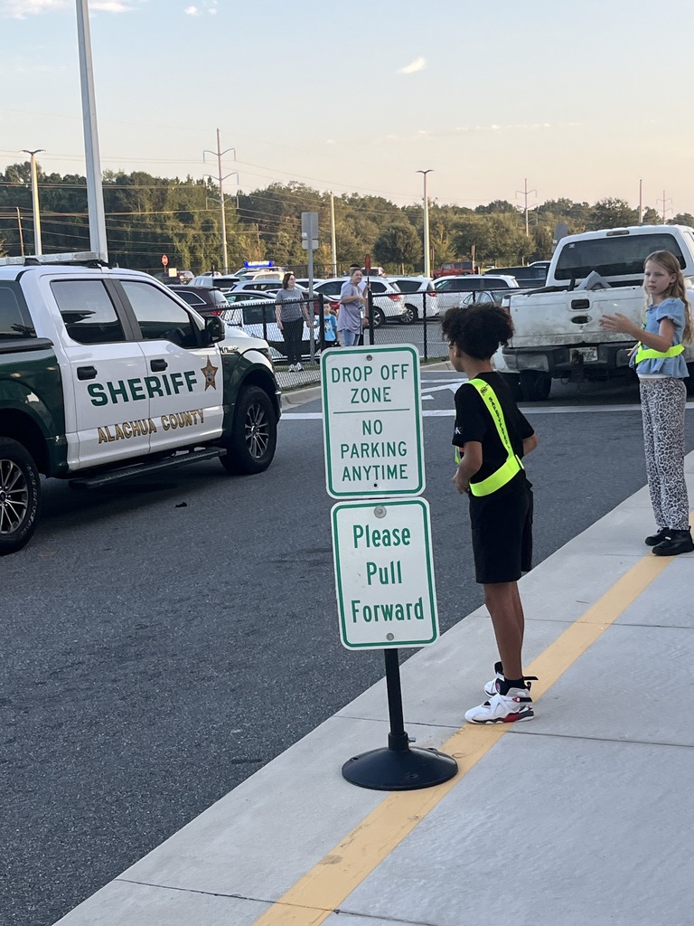 safety patrols waving cars down