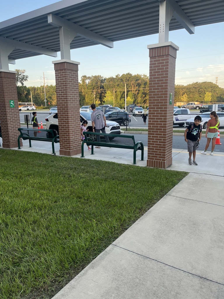 students being dropped off at school