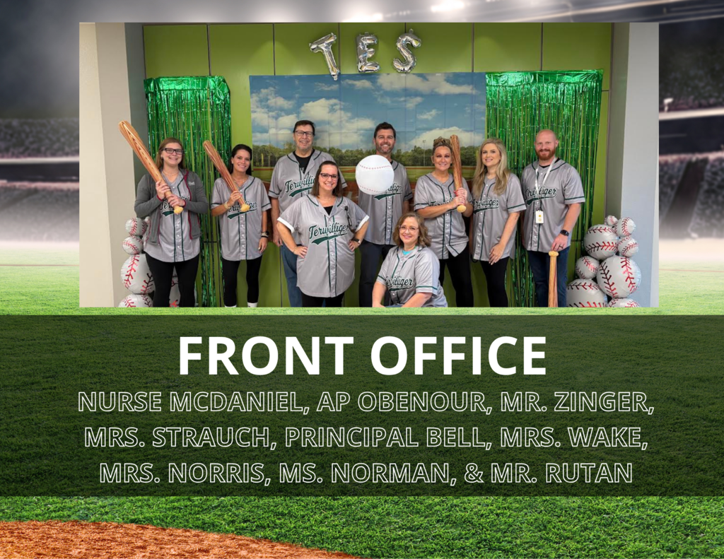 group picture of staff in front of a green background