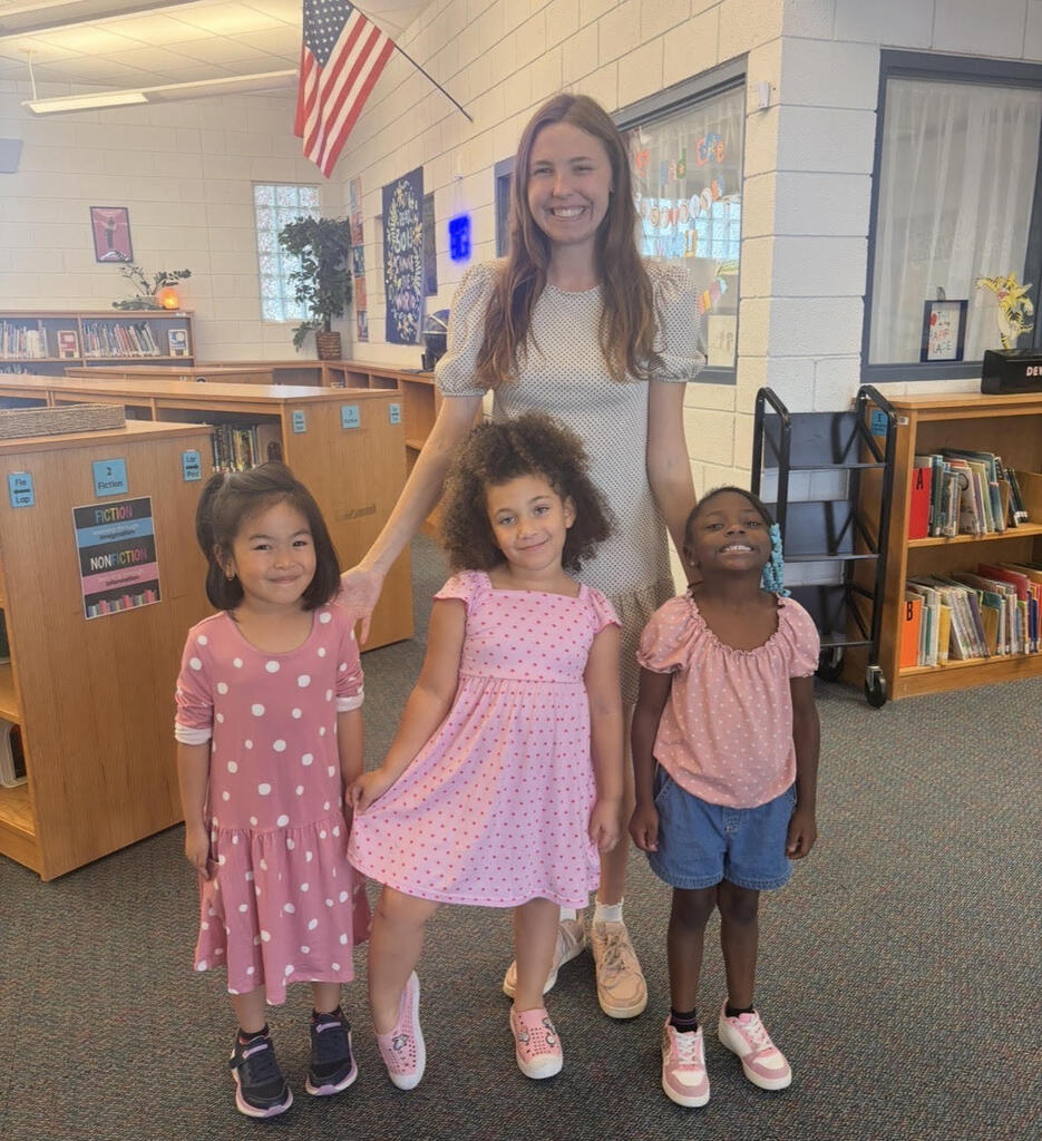 Teacher and students in polka dot clothing