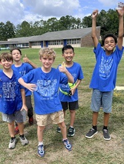 Group of students celebrating at Fun Run.