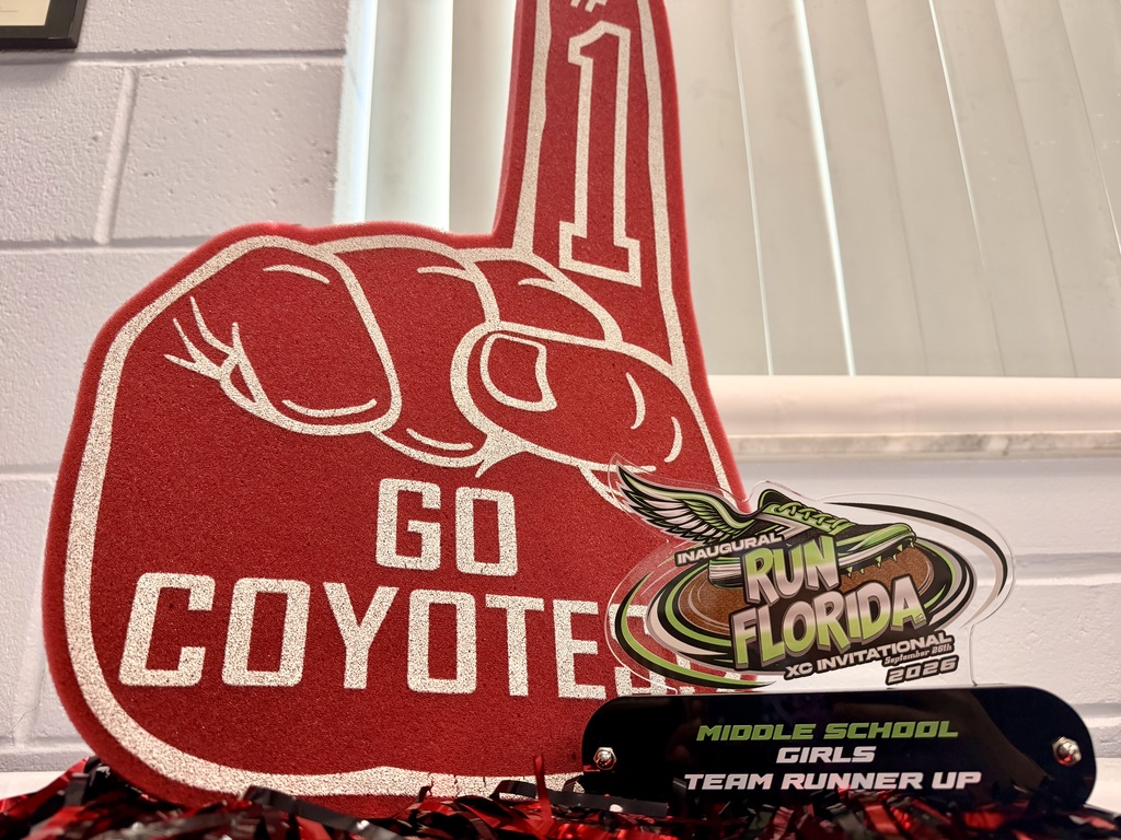 girls 2nd place trophy and red "go coyotes" foam finger