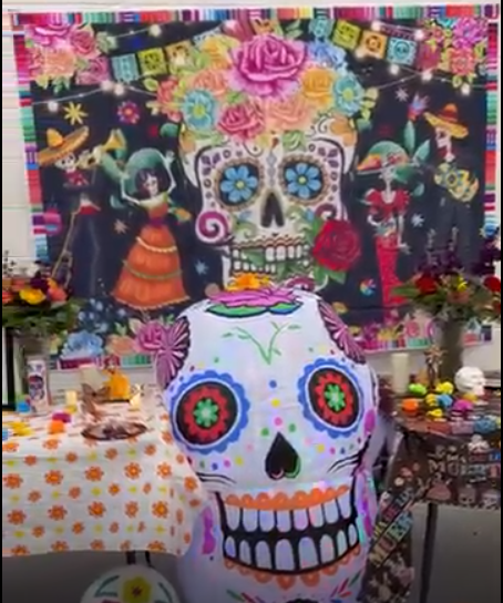 ofrenda in school lobby - very colorful celebrating the Day of the Dead