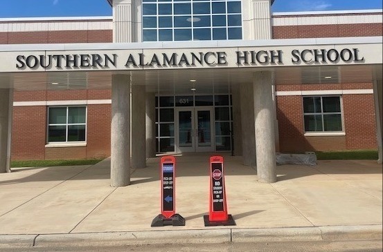 stu drop off signs in front of SAHS
