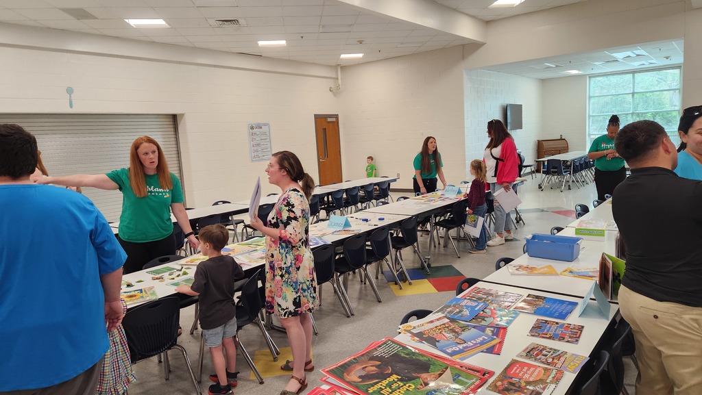 kindergarten open house Ms. Frediani giving information to a parent