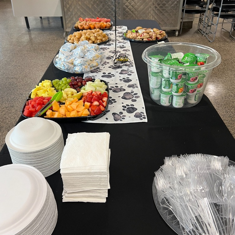 breakfast foods on a black tablecloth