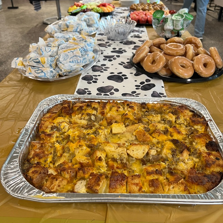 breakfast foods on a gold tablecloth