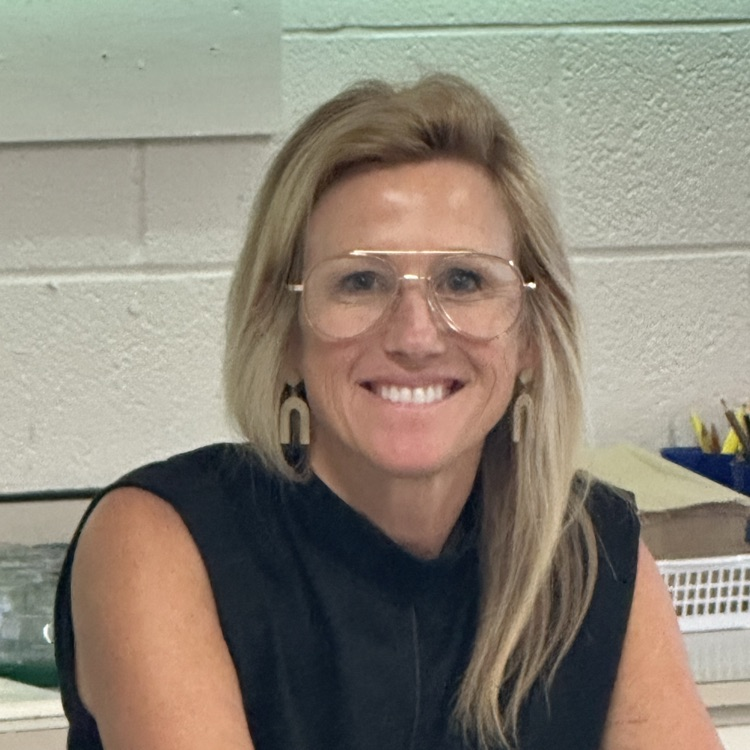 Mrs Brinskelle, art teacher, showing students how it’s done!
