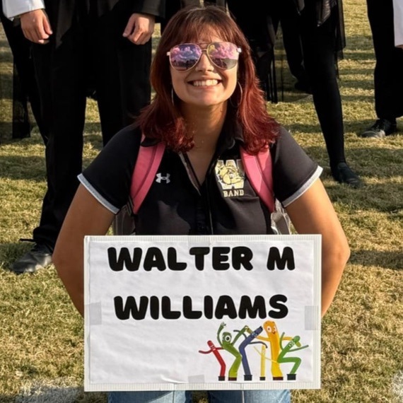 Ms Diaz poses at another winning band competition! 