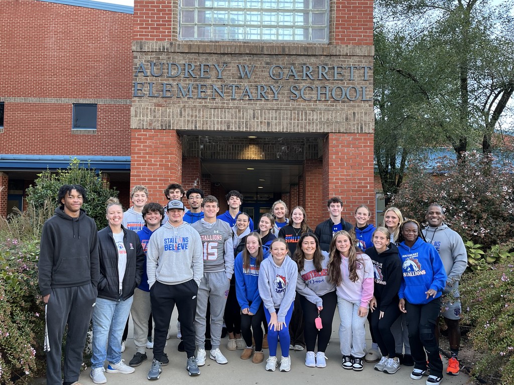 Southeast Alamance High School Dream Team and staff in front of Audrey W. Garrett Elementary School 