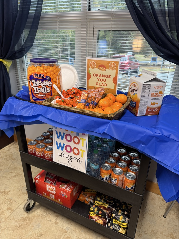 "Orange" you glad it's the end of Quarter 1??? Ms. Small & Mrs. Hamilton rolled out the "Woot Woot Wagon" today help our teachers and staff fuel up for a day full of Parent/Teacher Conferences tomorrow! #bluejaysbuildgreatness 💙💛