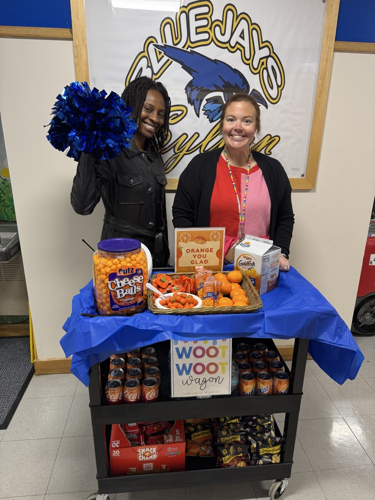 "Orange" you glad it's the end of Quarter 1??? Ms. Small & Mrs. Hamilton rolled out the "Woot Woot Wagon" today help our teachers and staff fuel up for a day full of Parent/Teacher Conferences tomorrow! #bluejaysbuildgreatness 💙💛