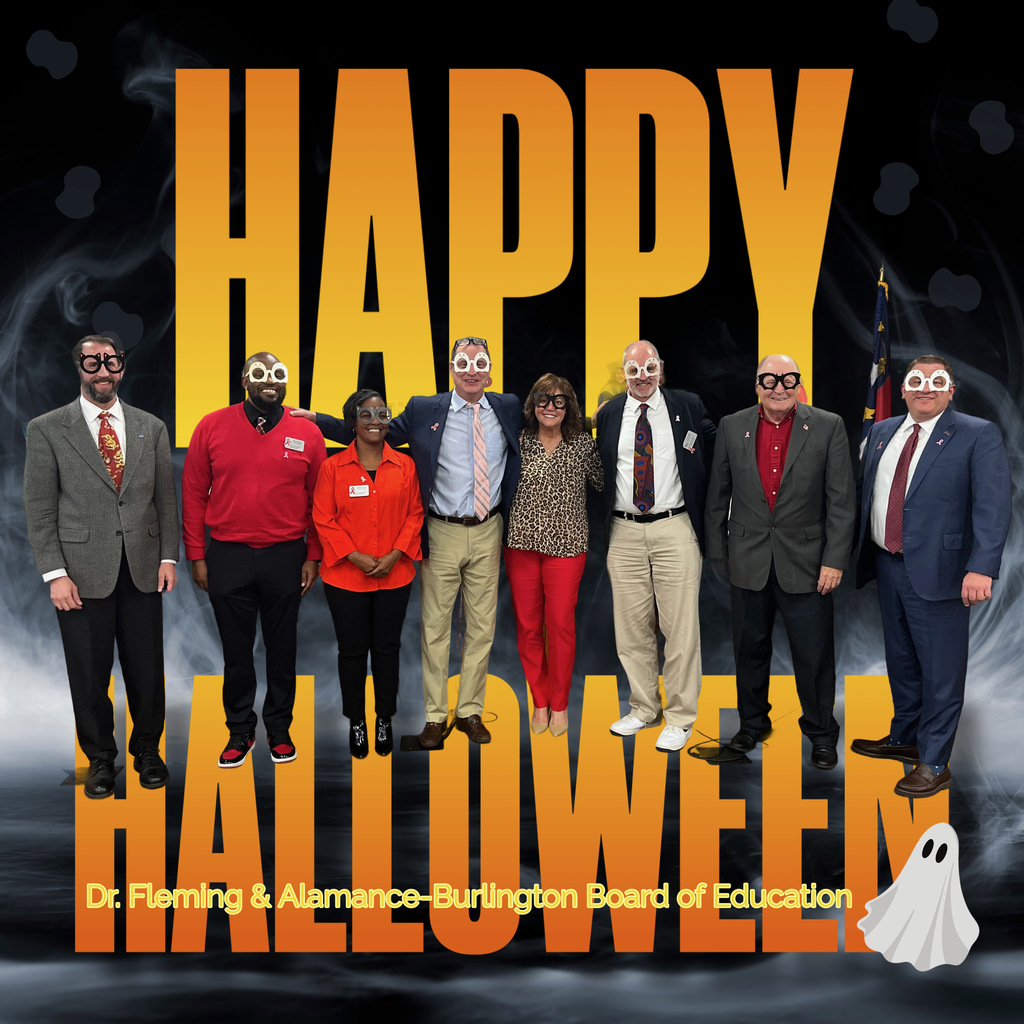 The School Board wearing themed glasses and a graphic saying Happy Halloween