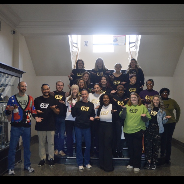 staff in various colors of shirts with the bulldog 6-7 logo on the front!