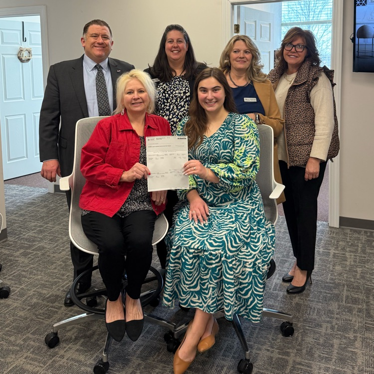 ABSS staff at Allen Tate Realtors for check presentation 