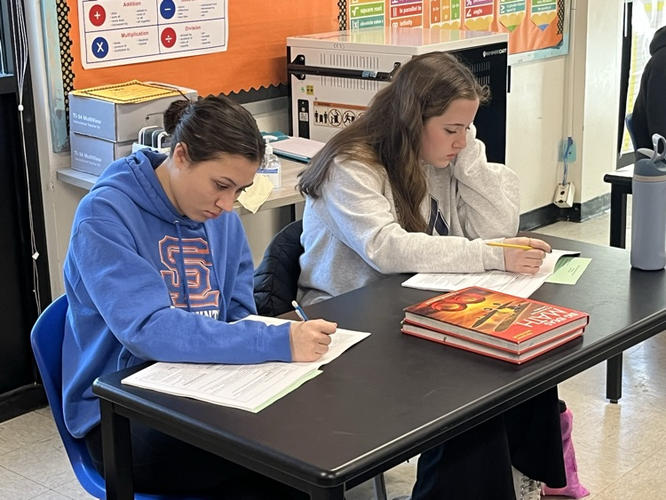 Two students concentrating at an ACT bootcamp