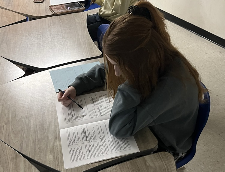 A student working on activities during an ACT prep session