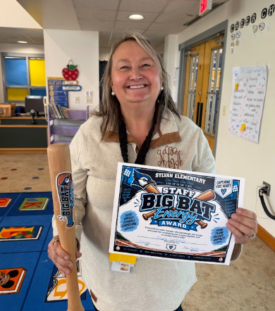 ⚾💙 BIG BAT ENERGY ALERT! 💙⚾  Some people simply walk into a room and make it better—and that’s exactly what our Big Bat Energy Award celebrates! This recognition goes to a Sylvan staff member who consistently brings the positivity, energy, encouragement, and heart that makes our team stronger.  They don’t just show up for our Blue Jays—they show up for their teammates, too. They are Capturing Kids’ Hearts AND co-workers’ hearts every single day, and that kind of energy is contagious! 💙  Congratulations to our Big Bat Energy Award winner, Mrs. Cummings! Keep bringing the energy, spreading the good, and making Sylvan a better place to be. 🔥⚾  One Team. One Goal. Step Up to the Plate!