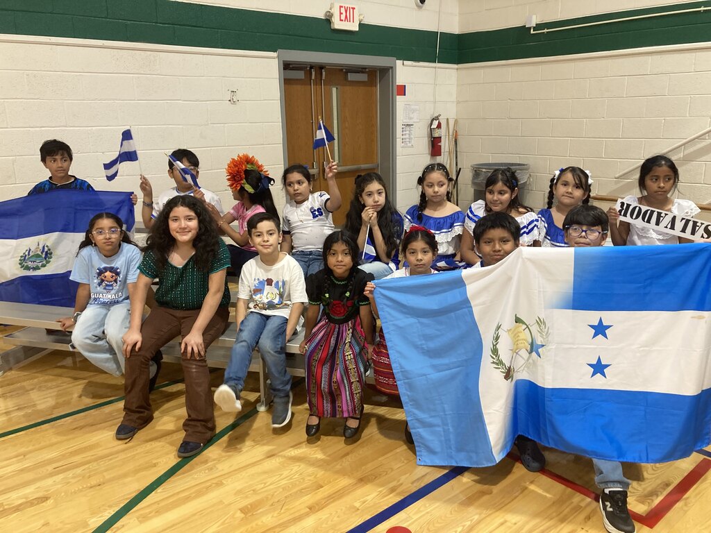 students showing country flags