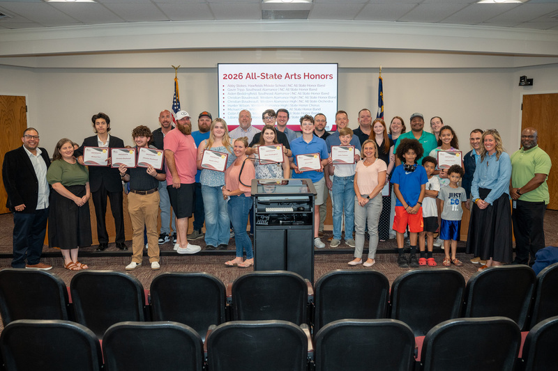 A large group of recognized students and their families